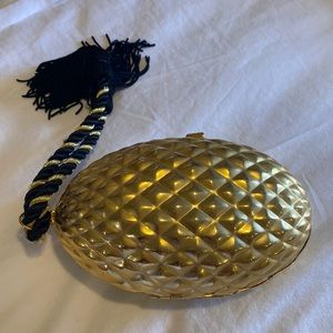 Gold clutch